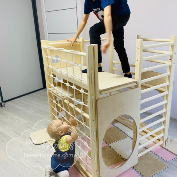 Children playing with a play gym for toddlers